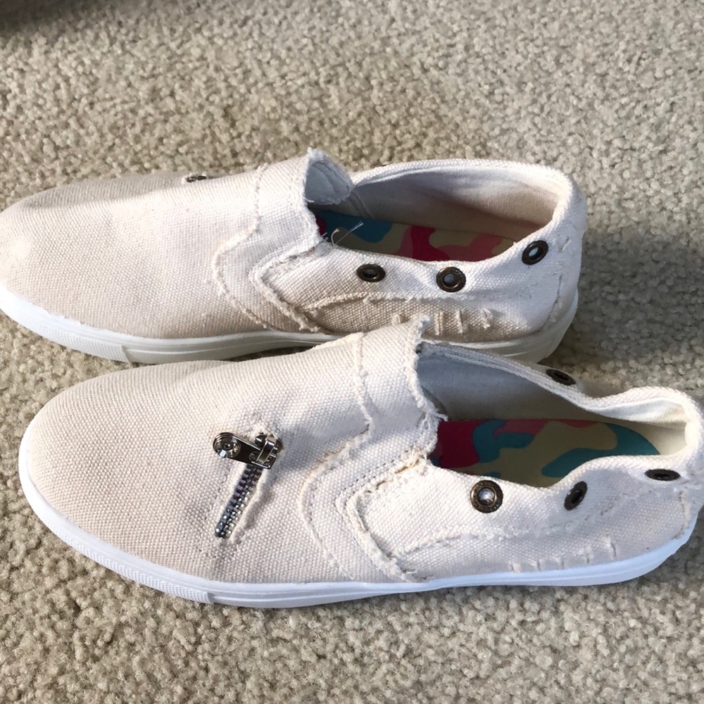 Brand new woman’s slip on canvas sneakers , sz 38